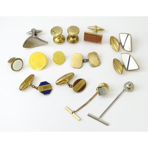 759 - A quantity of assorted items to include various studs, badges, cufflinks, etc. Together with two hat... 