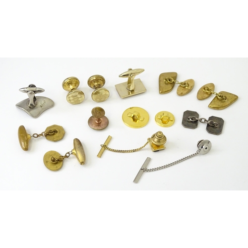 759 - A quantity of assorted items to include various studs, badges, cufflinks, etc. Together with two hat... 