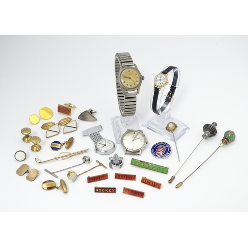 759 - A quantity of assorted items to include various studs, badges, cufflinks, etc. Together with two hat... 