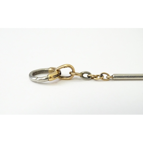 767 - An unusual yellow metal (tested 18ct gold) and platinum watch chain. Approx. 15 1/2