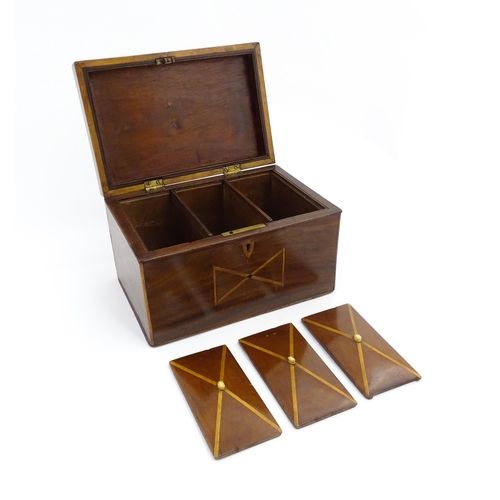 1283 - A 19thC mahogany tea caddy with inlaid decoration, opening to reveal three sections within. Together... 