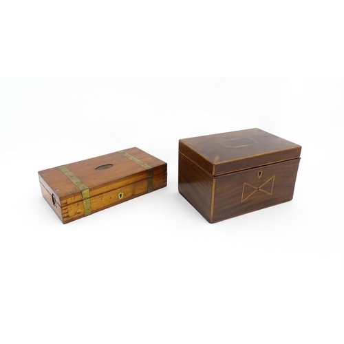 1283 - A 19thC mahogany tea caddy with inlaid decoration, opening to reveal three sections within. Together... 