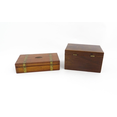 1283 - A 19thC mahogany tea caddy with inlaid decoration, opening to reveal three sections within. Together... 