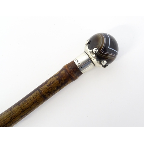 1293 - A Victorian bamboo walking stick / cane with banded agate pommel and silver crown mount hallmarked L... 