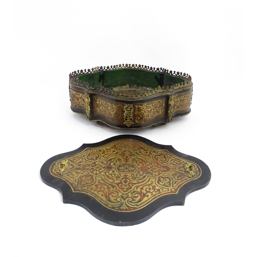 1299 - A 19thC French Boulle work lidded jardiniere / planter of shaped form with ormolu mounts and tin lin... 