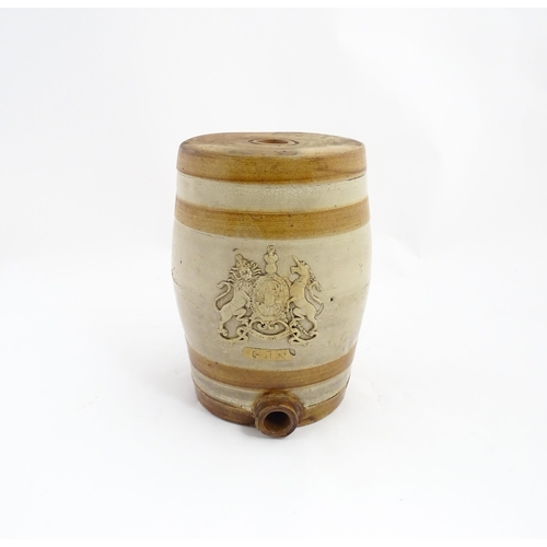 1312 - A 19thC stoneware Gin barrel bearing the coat of arms of the United Kingdom and labelled Gin under. ... 