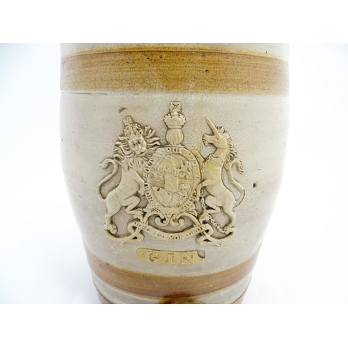 1312 - A 19thC stoneware Gin barrel bearing the coat of arms of the United Kingdom and labelled Gin under. ... 