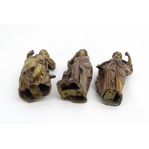 1313 - Three 19thC cast bronze sculptures depicting Classical maidens to include one standing before an anv... 