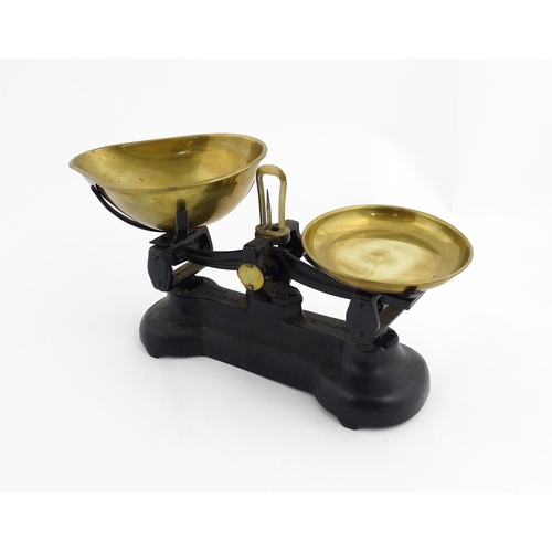 1315 - Early 20thC cast iron and brass Libra Scale Co. balance scales. Together with seven brass weights. S... 