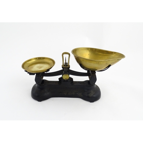 1315 - Early 20thC cast iron and brass Libra Scale Co. balance scales. Together with seven brass weights. S... 