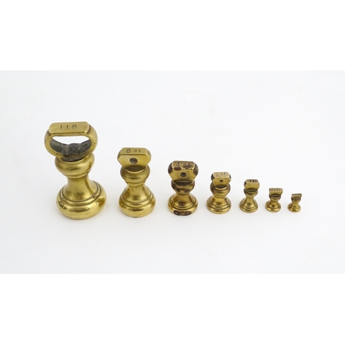 1315 - Early 20thC cast iron and brass Libra Scale Co. balance scales. Together with seven brass weights. S... 