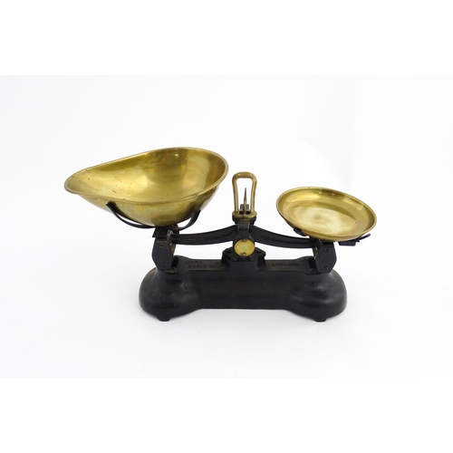 1315 - Early 20thC cast iron and brass Libra Scale Co. balance scales. Together with seven brass weights. S... 