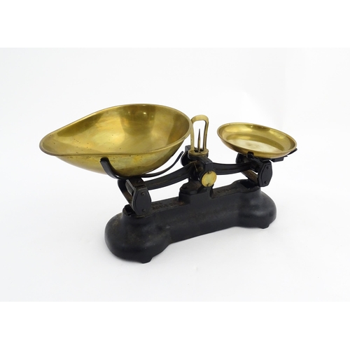 1315 - Early 20thC cast iron and brass Libra Scale Co. balance scales. Together with seven brass weights. S... 