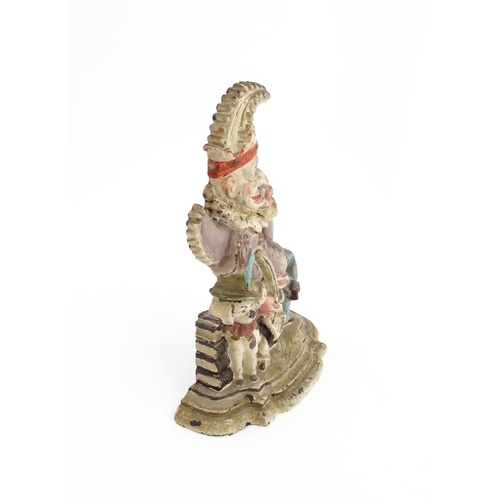 1317 - A cast door stop / door porter modelled as Mr Punch and Toby the dog, with polychrome decoration. Ap... 