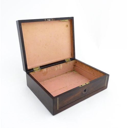 1319 - An early 20thC rosewood box with brass stringing and shaped plaque to top. Approx. 3 1/2