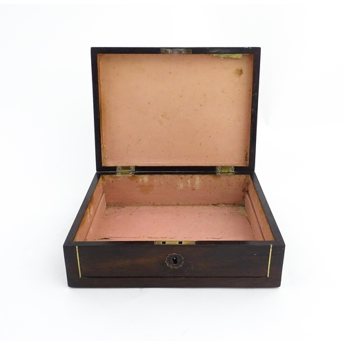 1319 - An early 20thC rosewood box with brass stringing and shaped plaque to top. Approx. 3 1/2