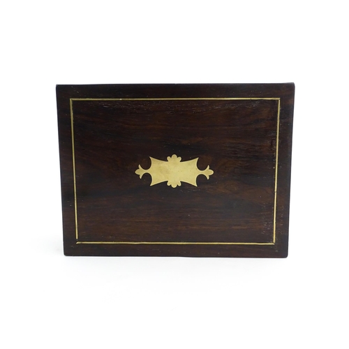 1319 - An early 20thC rosewood box with brass stringing and shaped plaque to top. Approx. 3 1/2