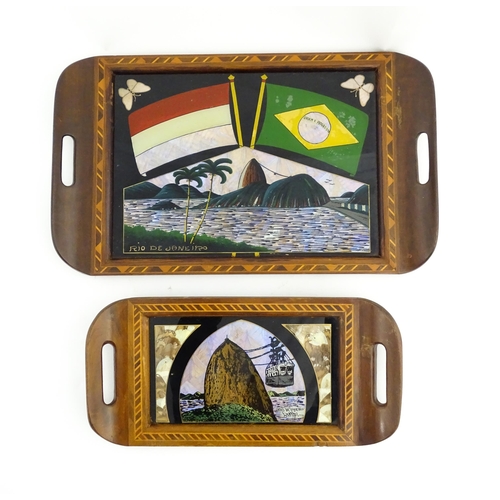 1320 - A 20thC Brazilian twin handled tray set with central scene depicting a Rio de Janeiro view with butt... 