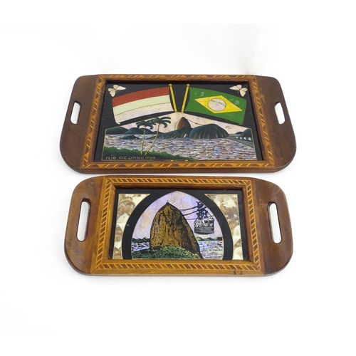 1320 - A 20thC Brazilian twin handled tray set with central scene depicting a Rio de Janeiro view with butt... 