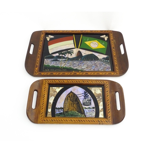 1320 - A 20thC Brazilian twin handled tray set with central scene depicting a Rio de Janeiro view with butt... 