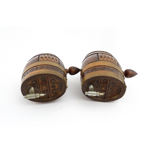 1322 - Two 20thC wooden barrels with carved decoration, and two miniature copper pails. Approx. 9