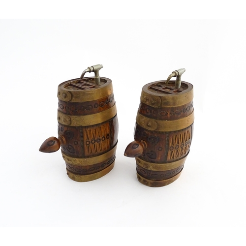 1322 - Two 20thC wooden barrels with carved decoration, and two miniature copper pails. Approx. 9