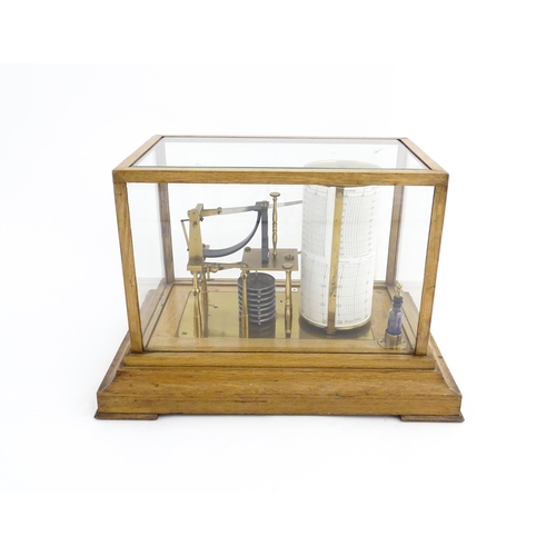 1323 - Meteorology & Scientific Interest: A 20thC Negretti & Zambra oak cased thermobarograph with single d... 