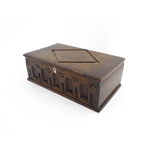 1327 - A late 17th / early 18thC oak box with carved decoration, possibly a Bible box. Approx. 5 1/2