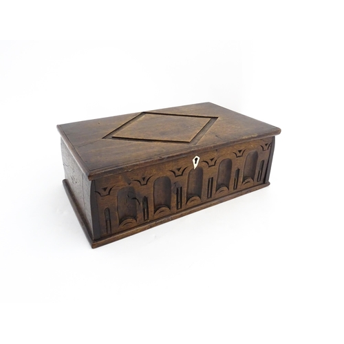 1327 - A late 17th / early 18thC oak box with carved decoration, possibly a Bible box. Approx. 5 1/2