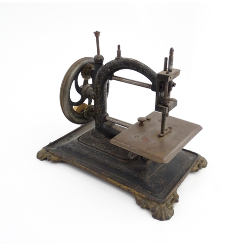 1330 - A late 19thC German manual hand crank sewing machine, possibly by Guhl & Harbeck. Approx. 9 1/4