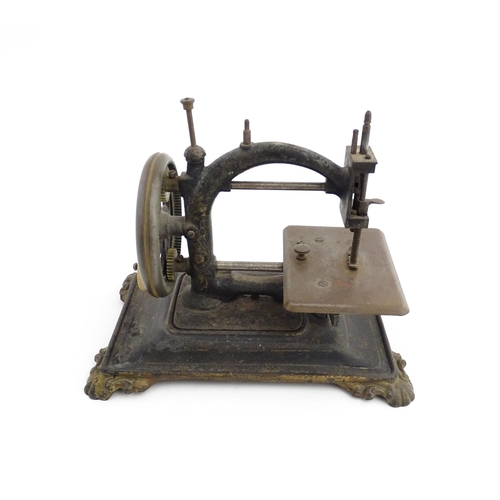 1330 - A late 19thC German manual hand crank sewing machine, possibly by Guhl & Harbeck. Approx. 9 1/4