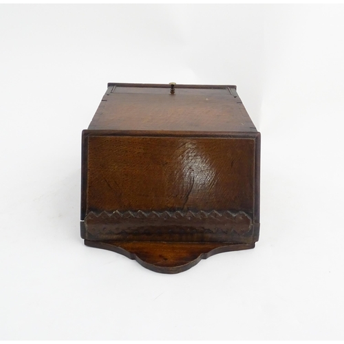 1331 - Treen : A 19thC oak wall mounted salt box, the lid with brass studded leather hinge, the base with s... 