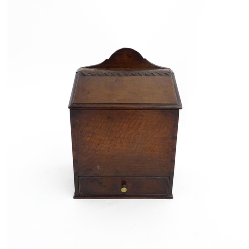 1331 - Treen : A 19thC oak wall mounted salt box, the lid with brass studded leather hinge, the base with s... 