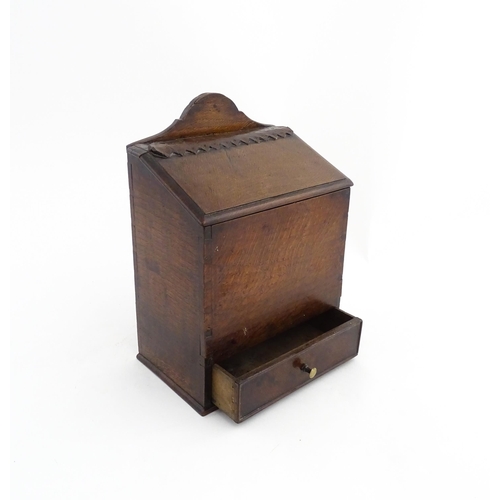 1331 - Treen : A 19thC oak wall mounted salt box, the lid with brass studded leather hinge, the base with s... 