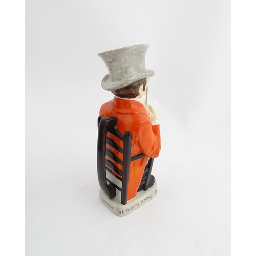 1332 - A 20thC Ashtead Potters limited edition Johnnie Walker advertising jug modelled as Percy Metcalfe. M... 