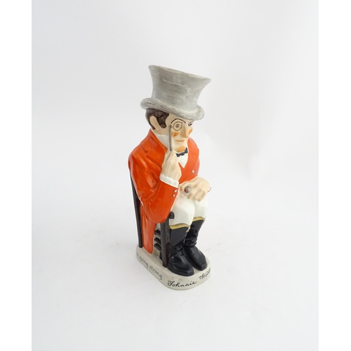 1332 - A 20thC Ashtead Potters limited edition Johnnie Walker advertising jug modelled as Percy Metcalfe. M... 