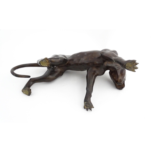 1333 - A 20thC cast bronze sculpture modelled as a panther / big cat. Approx. 13