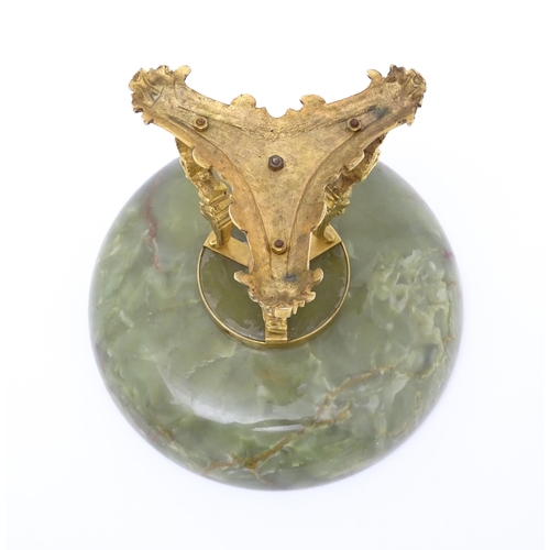 1343 - A Continental onyx tazza with gilt metal mounts and triform base with caryatid detail. Approx. 9 1/2... 