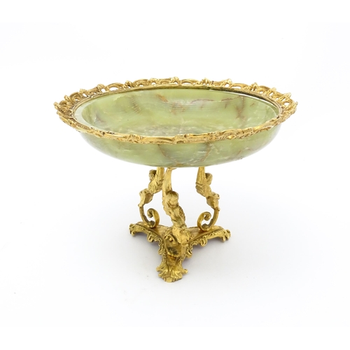 1343 - A Continental onyx tazza with gilt metal mounts and triform base with caryatid detail. Approx. 9 1/2... 