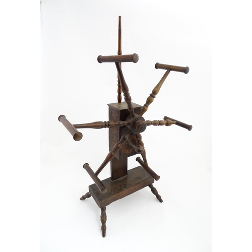 1349 - A late 18th / early 19thC clock / wrap / clack reel / spinner's weasel / wool winder with a six spok... 