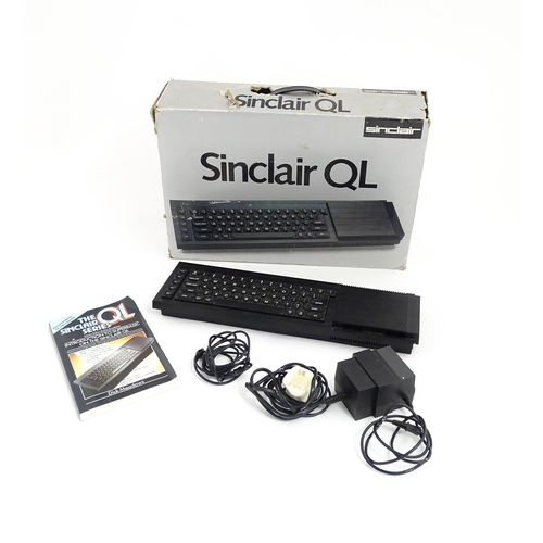 1351 - A boxed Sinclair QL personal computer (1984-1986), with cables and manual, approx 17