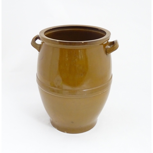 1360 - An early to mid 20thC large ceramic salt glazed pot / crock, with two handles, approx 18 1/4