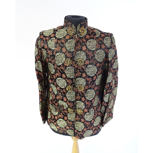 1385 - Vintage fashion / clothing: A vintage Chinese jacket c1950's, black with salmon and gold coloured de... 