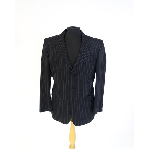 1395 - Vintage fashion / clothing: A dark grey pinstripe suit by Roderick Charles, comprising a single brea... 