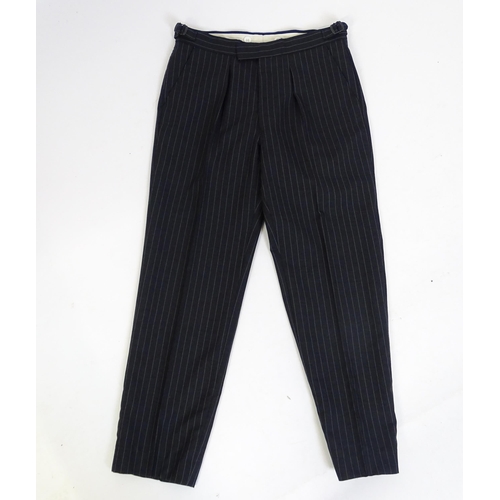 1395 - Vintage fashion / clothing: A dark grey pinstripe suit by Roderick Charles, comprising a single brea... 