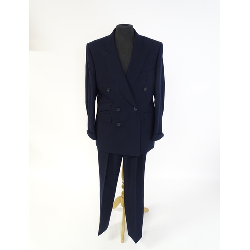 1396 - Vintage fashion / clothing: A gentleman's navy suit by Roderick Charles comprising a double breasted... 