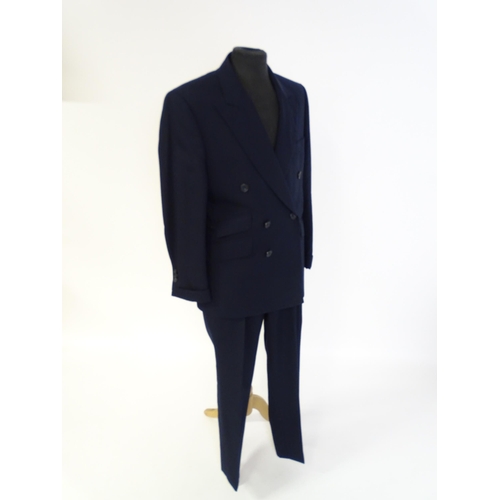 1396 - Vintage fashion / clothing: A gentleman's navy suit by Roderick Charles comprising a double breasted... 