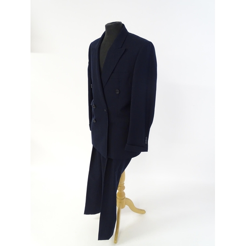 1396 - Vintage fashion / clothing: A gentleman's navy suit by Roderick Charles comprising a double breasted... 