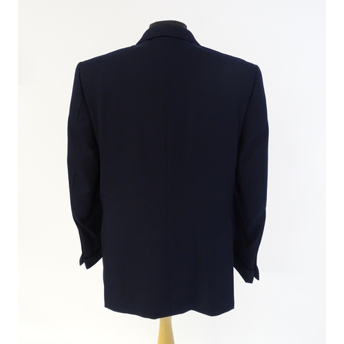 1396 - Vintage fashion / clothing: A gentleman's navy suit by Roderick Charles comprising a double breasted... 