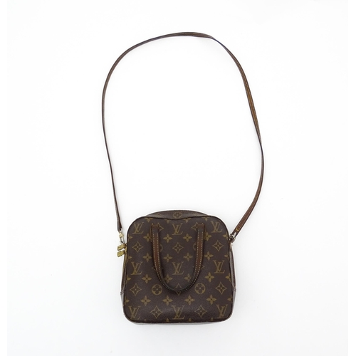 1400 - Vintage fashion / clothing: A Louis Vuitton Spontini leather handbag with classic brown monogram. Da... 